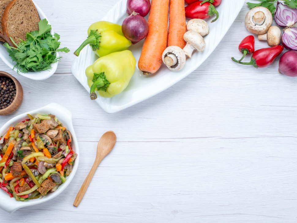 top-view-fresh-vegetable-salad-sliced-with-meat-along-with-bread-loafs-whole-vegetables-greens-light-food-meal-salad-vitamine